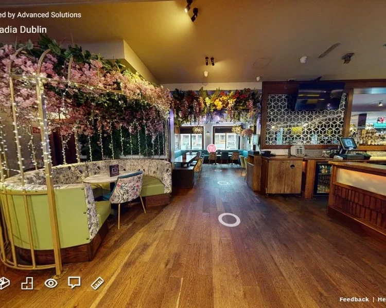 3D Virtual Tour of Arcadia Dublin showcasing the elegant bar interior, floral decor, and cosy seating areas.