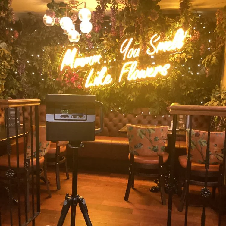 Matterport camera capturing a 3D Virtual Tour for a bar with vibrant decor and neon signage at The Botanic Dublin.