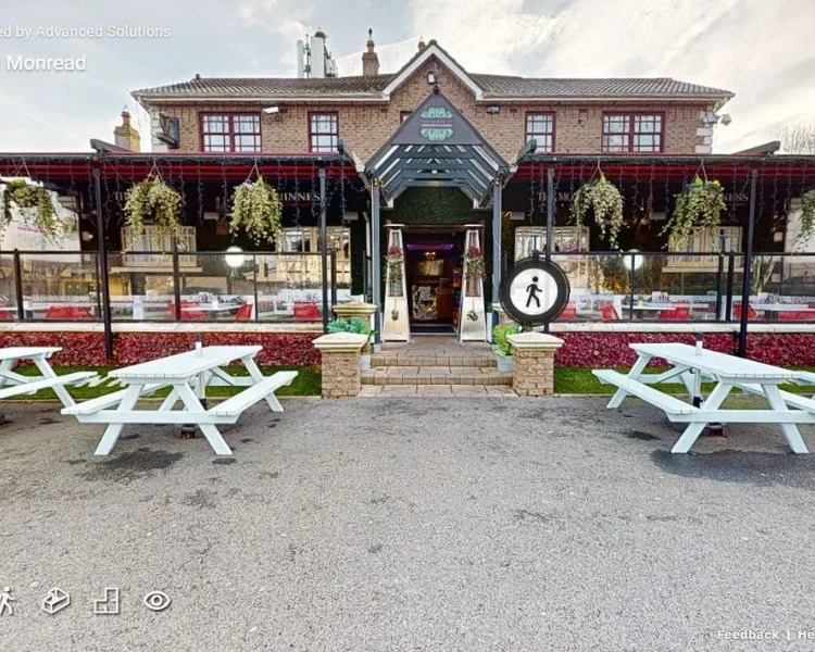 3D Virtual Tour of The Monread showcasing its inviting exterior, outdoor seating area, and charming pub design.